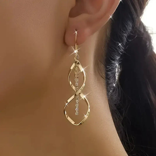 Sunbeam Spiral Oorbellen | Goud